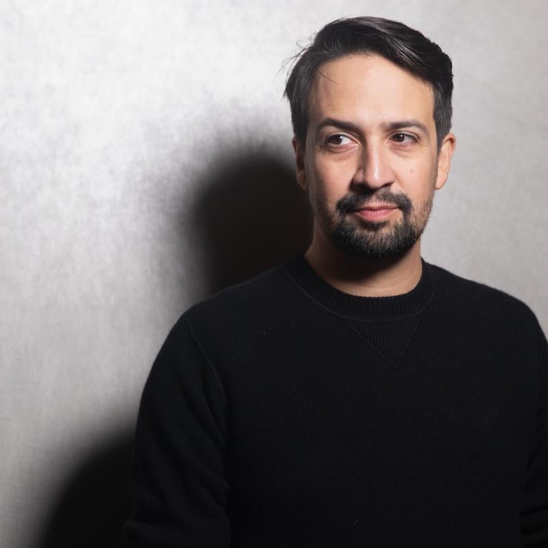 Lin-Manuel Miranda looking away from the camera