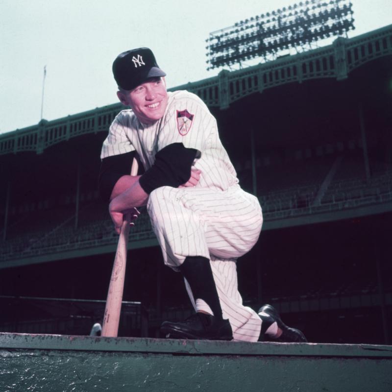 Baseball legend Mickey Mantle wearing a Yankees uniform before a game