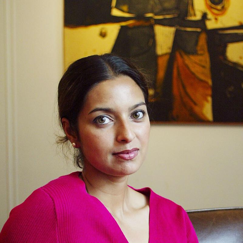 Writer Jhumpa Lahiri looks at the camera for a portrait