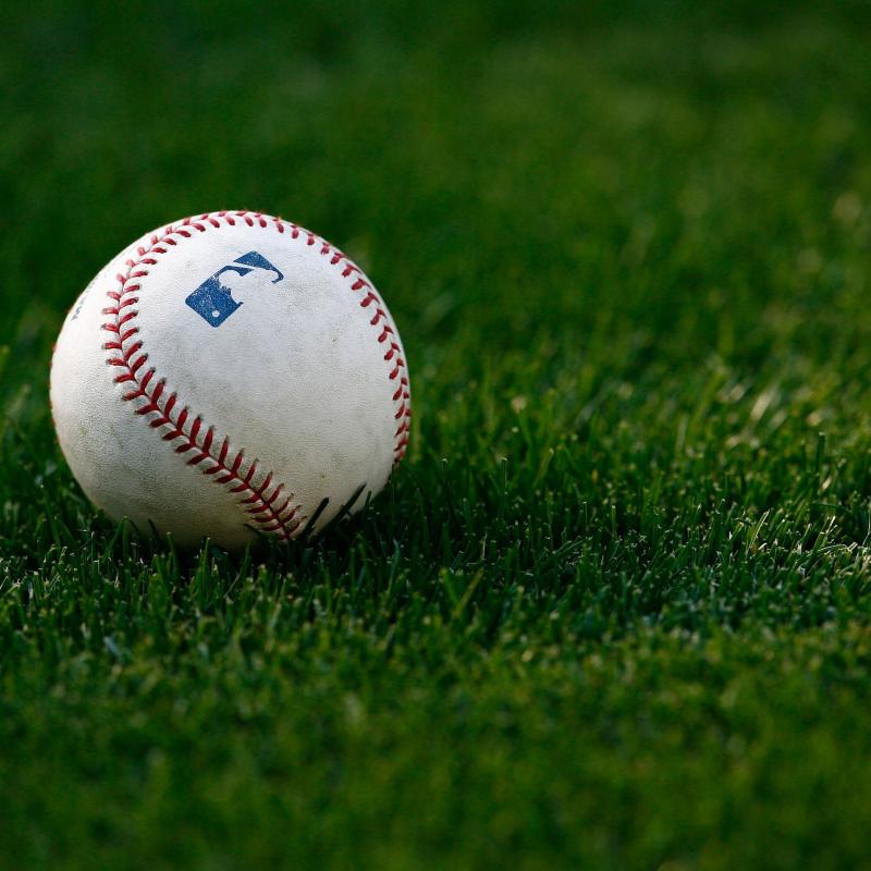 A baseball showing the Major League Baseball logo.